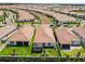 Aerial view of a neighborhood showcasing well-kept homes and community landscaping at 17249 Star Banks St, Wimauma, FL 33598