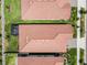 Aerial view showing a well-maintained roof and landscaping of the beautiful neighborhood at 17249 Star Banks St, Wimauma, FL 33598