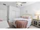 Comfortable bedroom with white walls and a ceiling fan at 17249 Star Banks St, Wimauma, FL 33598