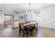 The dining area overlooks the kitchen and living room with slider access to the lanai at 17249 Star Banks St, Wimauma, FL 33598