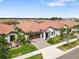 Beautiful single-Gathering home in a Primary-planned community, showcasing modern design and landscaping at 17249 Star Banks St, Wimauma, FL 33598