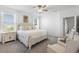 Serene main bedroom with plush carpeting, bright windows, and a peaceful ambiance at 17249 Star Banks St, Wimauma, FL 33598