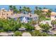 Beautiful aerial view of waterfront home surrounded by lush greenery at 1811 Bayou Grande Ne Blvd, St Petersburg, FL 33703
