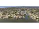 Waterfront property with beautiful landscaping and stunning views of the bay from this desirable neighborhood at 1811 Bayou Grande Ne Blvd, St Petersburg, FL 33703