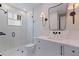 Modern bathroom with glass shower, white vanity, and stylish fixtures at 1811 Bayou Grande Ne Blvd, St Petersburg, FL 33703