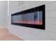 Close-up of a modern electric fireplace with a sleek design and built-in lighting at 1811 Bayou Grande Ne Blvd, St Petersburg, FL 33703