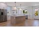 Open kitchen featuring stainless steel appliances, a large island, and ample cabinet space at 1811 Bayou Grande Ne Blvd, St Petersburg, FL 33703
