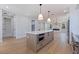 Spacious kitchen with a large island, stainless steel appliances, and an open layout at 1811 Bayou Grande Ne Blvd, St Petersburg, FL 33703