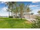 Charming waterfront home with lush landscaping and a two-car garage at 1819 Bayou Grande Ne Blvd, St Petersburg, FL 33703