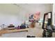 This bonus room can be used as a gym or playroom, and has lots of natural light and neutral carpet at 1940 Floresta View Dr, Tampa, FL 33618