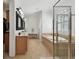 Open bathroom floorplan features a soaking tub, stand up shower, double vanities and lots of natural light at 1940 Floresta View Dr, Tampa, FL 33618