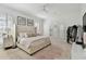 Spacious main bedroom features a ceiling fan, luxury carpet and shuttered windows that let in plenty of natural light at 1940 Floresta View Dr, Tampa, FL 33618