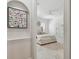 An open bedroom with great lighting and a large rug at 1940 Floresta View Dr, Tampa, FL 33618