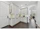 Well-appointed pantry features ample storage, granite countertops, and modern appliances at 1940 Floresta View Dr, Tampa, FL 33618