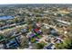Aerial picture showing a home located near a scenic lake with easy access to local shopping areas at 1990 59Th N St, St Petersburg, FL 33710