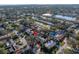 An aerial view of a neighborhood featuring many homes and beautiful lake views at 1990 59Th N St, St Petersburg, FL 33710