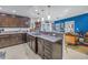Spacious kitchen with granite counters, ample cabinet space, and modern pendant lighting at 1990 59Th N St, St Petersburg, FL 33710