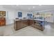 Kitchen island with a modern cooktop and built-in microwave, designed for cooking and entertaining at 1990 59Th N St, St Petersburg, FL 33710
