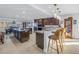 Kitchen with breakfast bar seating, stainless steel appliances, and an open layout at 1990 59Th N St, St Petersburg, FL 33710