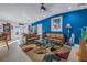 Comfortable living room with modern decor and easy access to kitchen and outdoor patio at 1990 59Th N St, St Petersburg, FL 33710