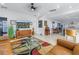 Bright living room with open floor plan and views of kitchen and dining areas at 1990 59Th N St, St Petersburg, FL 33710