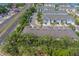 A desirable townhome community showcases well-maintained exteriors and convenient access to nearby roadways and waterfront views at 2013 Sunset Wind Loop, Oldsmar, FL 34677