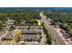 A desirable townhome community showcases well-maintained exteriors and convenient access to nearby roadways and waterfront views at 2013 Sunset Wind Loop, Oldsmar, FL 34677