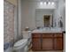 This bathroom features a combination shower and tub, toilet, and modern vanity at 2013 Sunset Wind Loop, Oldsmar, FL 34677