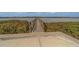 Private wooden dock offers direct waterfront access at 2013 Sunset Wind Loop, Oldsmar, FL 34677