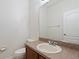 Bathroom featuring a vanity with wood cabinets and a white sink at 20221 Vintage Oaks Pl, Tampa, FL 33647