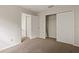 Bedroom with neutral carpet, walk-in closet, and doorway to connecting rooms at 20221 Vintage Oaks Pl, Tampa, FL 33647