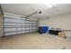 Spacious two-car garage featuring an automatic door, providing ample space for parking and storage at 20221 Vintage Oaks Pl, Tampa, FL 33647