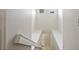 View of a staircase with high windows allowing natural light at 20221 Vintage Oaks Pl, Tampa, FL 33647