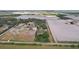 Picturesque homesite with horse paddocks and fields, offering a blend of country living and natural beauty at 20413 Keene Rd, Wimauma, FL 33598