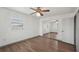This bedroom features a window and a closet with mirrored sliding doors at 20413 Keene Rd, Wimauma, FL 33598
