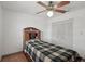 Bedroom featuring a ceiling fan, and closet space at 20413 Keene Rd, Wimauma, FL 33598