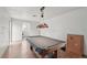 Spacious game room featuring a pool table and ample room for recreation activities at 20413 Keene Rd, Wimauma, FL 33598