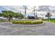 Sun City Center Veterans Memorial Community Hall featuring lush landscaping and a welcoming entrance at 2216 W Del Webb Blvd, Sun City Center, FL 33573