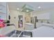 Updated kitchen featuring an island, sink with a window, and modern appliances at 2216 W Del Webb Blvd, Sun City Center, FL 33573
