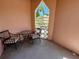 Private outdoor seating area with a view of the neighborhood at 2457 Ecuadorian Way # 57, Clearwater, FL 33763