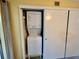 Efficient laundry area with stacked washer and dryer, maximizing space in the home at 2457 Ecuadorian Way # 57, Clearwater, FL 33763