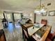 Charming space with living and dining areas that showcase wood flooring at 2457 Ecuadorian Way # 57, Clearwater, FL 33763