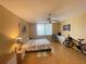 Bright bedroom with ceiling fan, and large window offering natural light and space for a bed at 2615 Cove Cay Dr # 408, Clearwater, FL 33760
