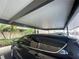 Assigned carport parking with number 1511 conveniently protects the vehicle from the elements at 2615 Cove Cay Dr # 408, Clearwater, FL 33760