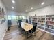 Large meeting room featuring bright lighting, modern design, large table, and plenty of seating at 2615 Cove Cay Dr # 408, Clearwater, FL 33760