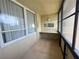 Enclosed patio space offering great light and the perfect place for working or enjoying a quiet moment at 2615 Cove Cay Dr # 408, Clearwater, FL 33760