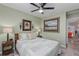 Cozy bedroom with a neutral color scheme, comfortable bedding, and elegant artwork at 297 Lakeview Dr, Tarpon Springs, FL 34689