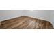 Bedroom featuring wood-look tile floors and a large window at 3079 Osprey Ln, Clearwater, FL 33762