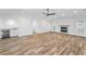 The living room includes a fireplace, and is conveniently situated near a wet bar and other areas of the home at 3079 Osprey Ln, Clearwater, FL 33762