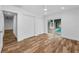 Main bedroom with sliding glass doors overlooking a swimming pool at 3079 Osprey Ln, Clearwater, FL 33762